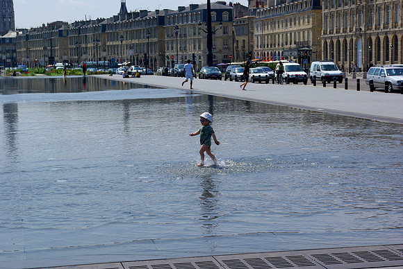 Child on Mirror Pool -- Bordeaux
